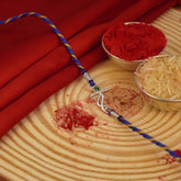 Ā Mystic Melody Silver Rakhi