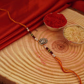 Delightful Divine Bloom Silver Rakhi
