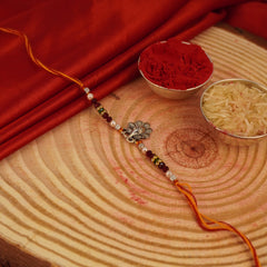 Delightful Divine Bloom Silver Rakhi